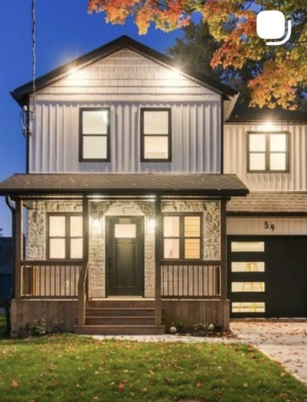 Two-storey new build with stone and board-and-batten